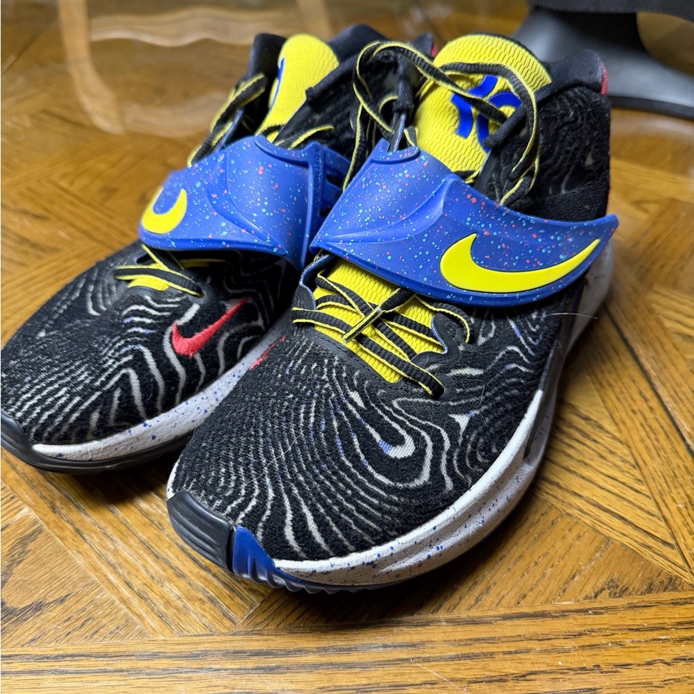 Nike Black Athletic Shoes with Blue and Yellow Accents